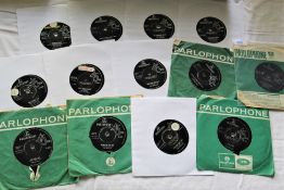 A lot of Beatles UK 45'S with some in company sleeves - 13 in total