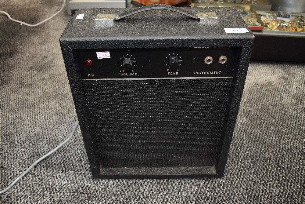 A vintage solid state guitar or instrument amp