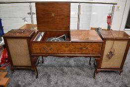 A vintage walnut cased Dynatron radiogram, on cabriole legs