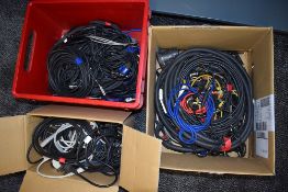Three boxes of assorted audio and power cables