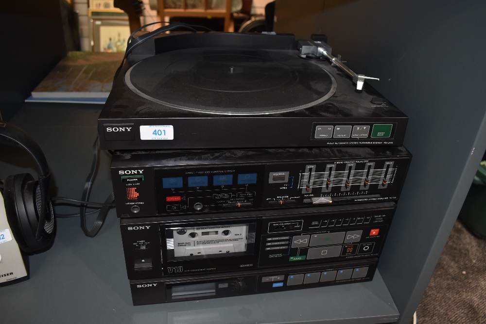 A vintage 80's Akai stackable record cassette and radio system