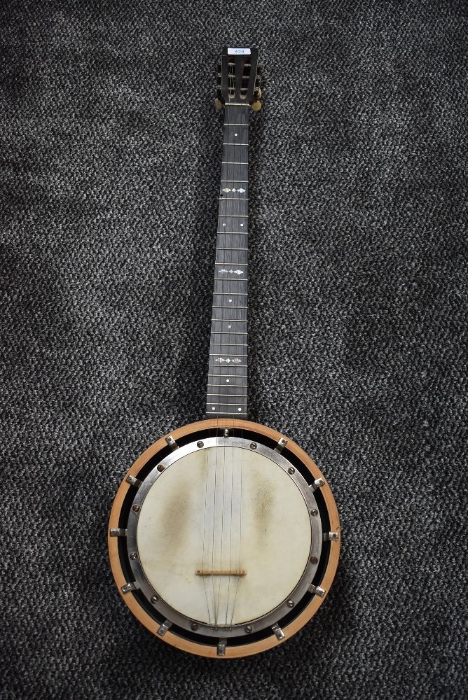 An early 20th Century 5 string Banjo, impressed mark W E TEMLETT, LONDON, Apollo Model number three,