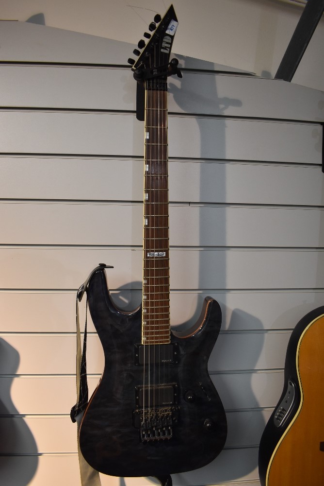 An ESP electric guitar, MH-301, with hard case, Korean made, serial number W0229476