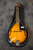 A Chord mandolin, sunburst with padded gig bag