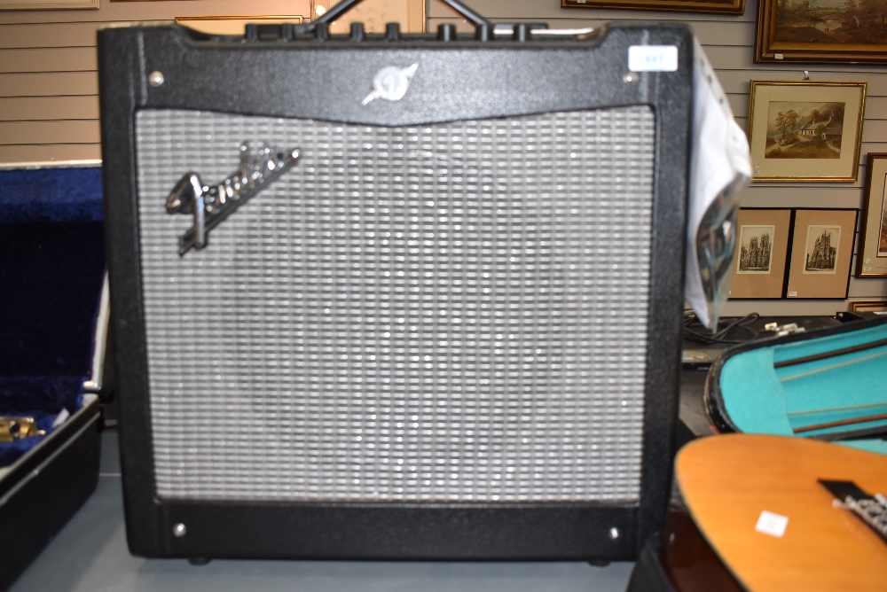 A Fender Mustang 110W combo amplifier (DSP)