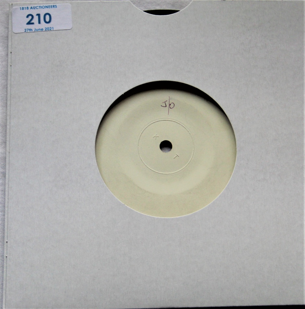 A white label Apple one sided test press of ' open your box ' by the Plastic Ono Band - been play