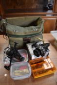 A large selection of fishing tackle including two spinning reels in nice canvas fishing bag with two