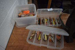 A selection of spinning lures and fishing minnows.