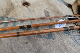 A split cane fly rod marked D. Pollard with sleeve