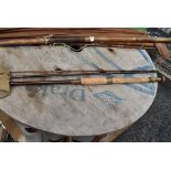 An 11ft Gow of Dundee three piece fly rod with spare tip and sleeve