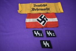 Two WW2 German SS2 Collar Patches both on black felt, one with silver wire and black twist cord