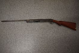 An early 20th century .177 break action Air Rifle having hexagonal barrel, side catch lever,