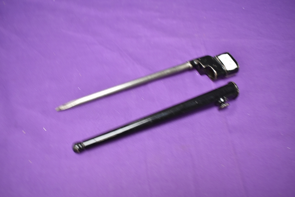 A British 1942 MK2 No4 Rifle Bayonet, with metal scabbard