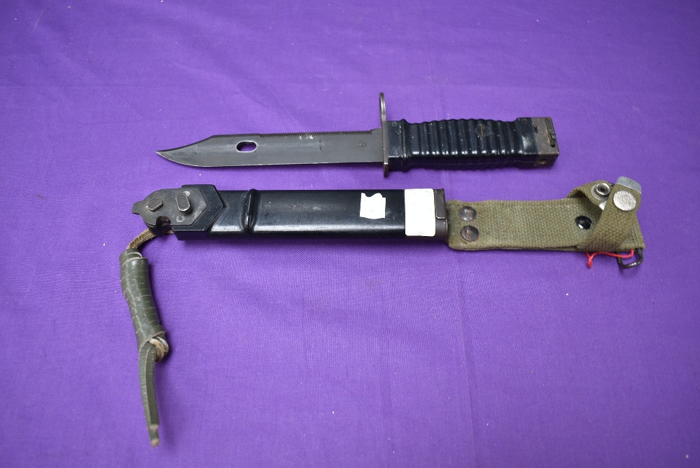 A German 1963 Stoner Assault Rifle Bayonet, blade marked Carl Eickhorn & Co Solingen, metal