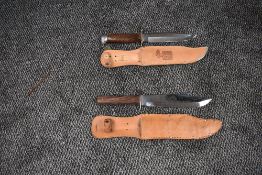 Two Original Bowie Knives in Leather Scabbards, Linder Messer Solingen and Made in Italy