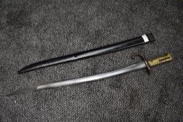 A French Sword Bayonet for Chassepot Rifle 1866 with metal scabbard, numbered on crossguard