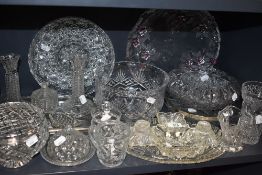 A selection of clear cut and crystal glass wares including fruit bowl and snack dishes