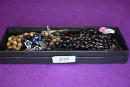 A selection of Roman Catholic rosary beads and crucifix