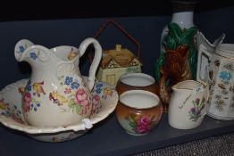 A selection of ceramics including Devon fish jugs and wash jug and bowl set