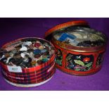 Two tins of vintage dress makers or haberdashery buttons and fasteners