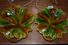 A pair of majolica style leaf dishes.