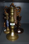 Four vintage candle sticks including one having blue and white detail to stem and an antique cast