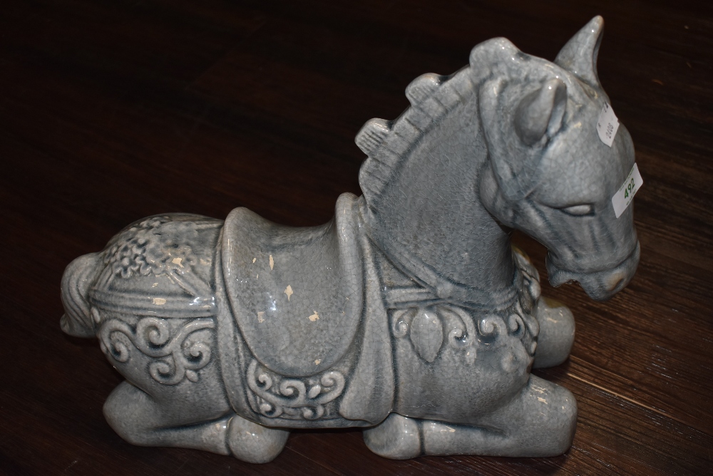 A large ceramic figure of a Tang style horse approx 70cm long