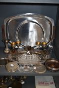 A selection of table and plated wares including trays goblets and candle stick