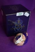 A ceramic Royal Crown Derby paper weight or figure of an Imari Quail having gold stopper and box