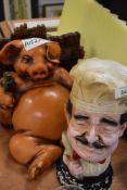 Two novelty cooking related figures of a chef and fat pig