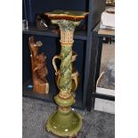 An antique Minton Majollica jardiniere plant or torchere stand in an art nouveau style standing 90cm