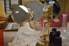 Three brass effect dressing table mirrors a bridge counter and a pair of Aintree De-Luxe 8x30