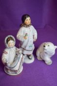 A selection of Russian indigenous Inuit and a polar bear all being hand decorated