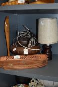 A selection of treen wood items including incense items and turned lamp base