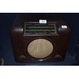 A vintage Art Deco styled bakelite radio by Bush the DAC 90 with glass and case in great condition