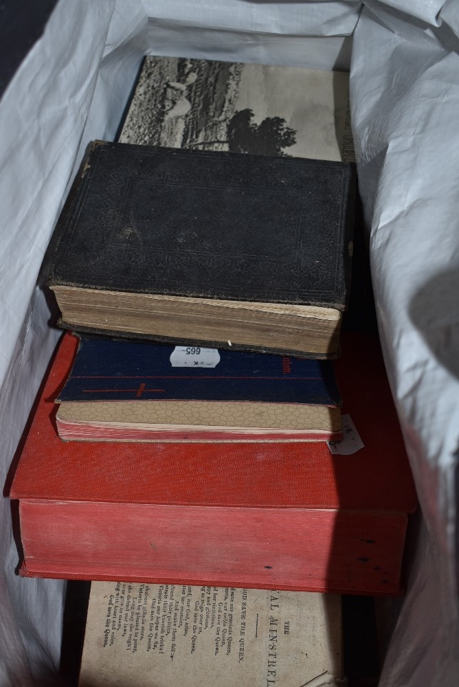 An assortment of vintage and antique bibles and similar.