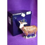 A ceramic Royal Crown Derby paper weight or figure of a Nanny Goat having gold stopper and box