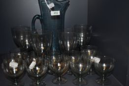 A nice set of aqua green glass including six large goblet, twelve smaller goblet and decanter