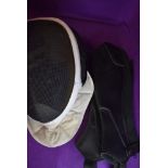 A vintage fencing mask by Leon Paul and a pair of leather arm guards