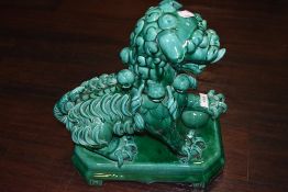 A large jade green glazed figure of a dog of fo or foo