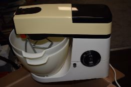 A kitchen aid or Chefs mixer possibly by Kenwood having accessories