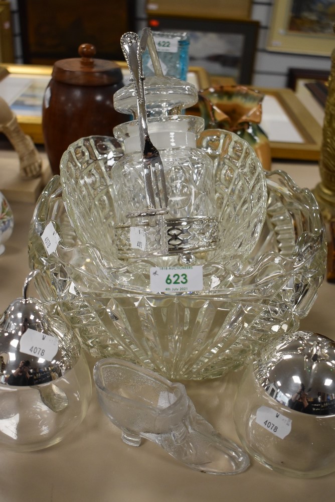 A selection of clear cut crystal glass wares including fruit style condiment glasses