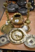 A selection of brass and similar wares including Automobile Rally dishes and heavy set candle