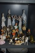 A selection of figures and figurines including elephant figure and Nao styles