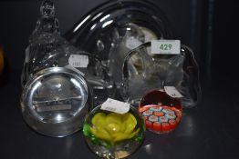 A selection of clear cut and art glass paper weights including Mikasa clock