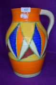 A reproduction large water jug bearing Clarice Cliff Bizzare stamp to base