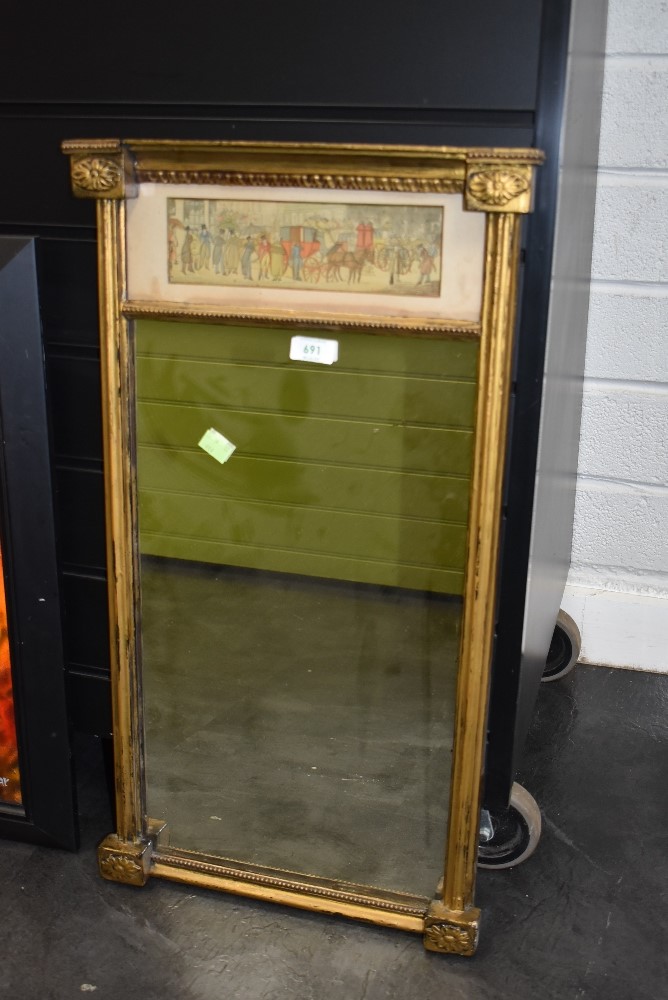 A late Victorian hall way mirror having gilt and gesso frame with carriage print atop