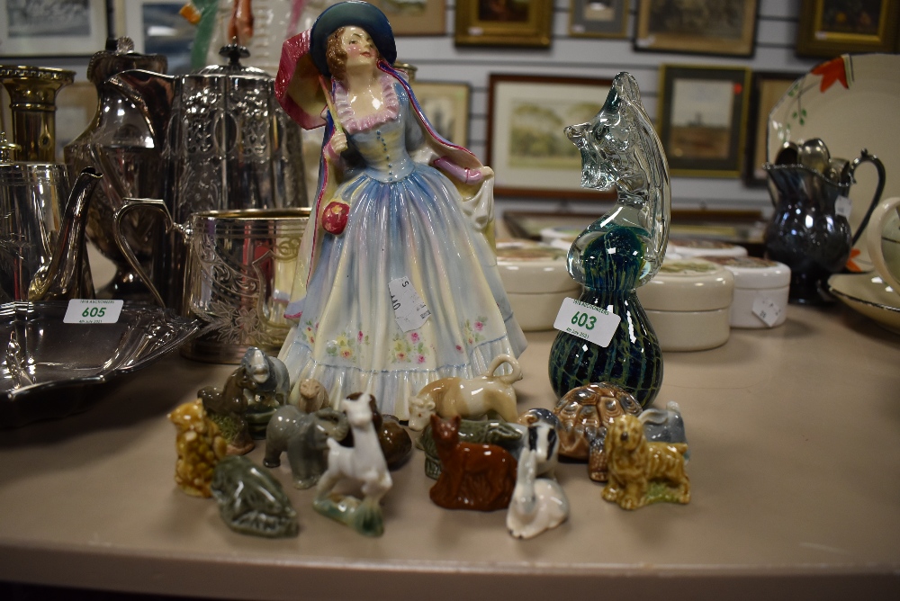 A selection of Wade figures and similar Royal Doulton Mirabel figurine