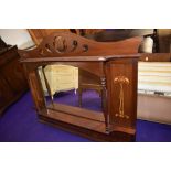 An Edwardian mahogany over mantel mirror, having Art Nouveau style inlay decoration