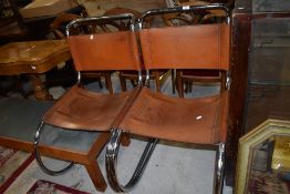 A lovely pair of mid century designer chairs, Chromed framed, leather seats/backs, probably P E L